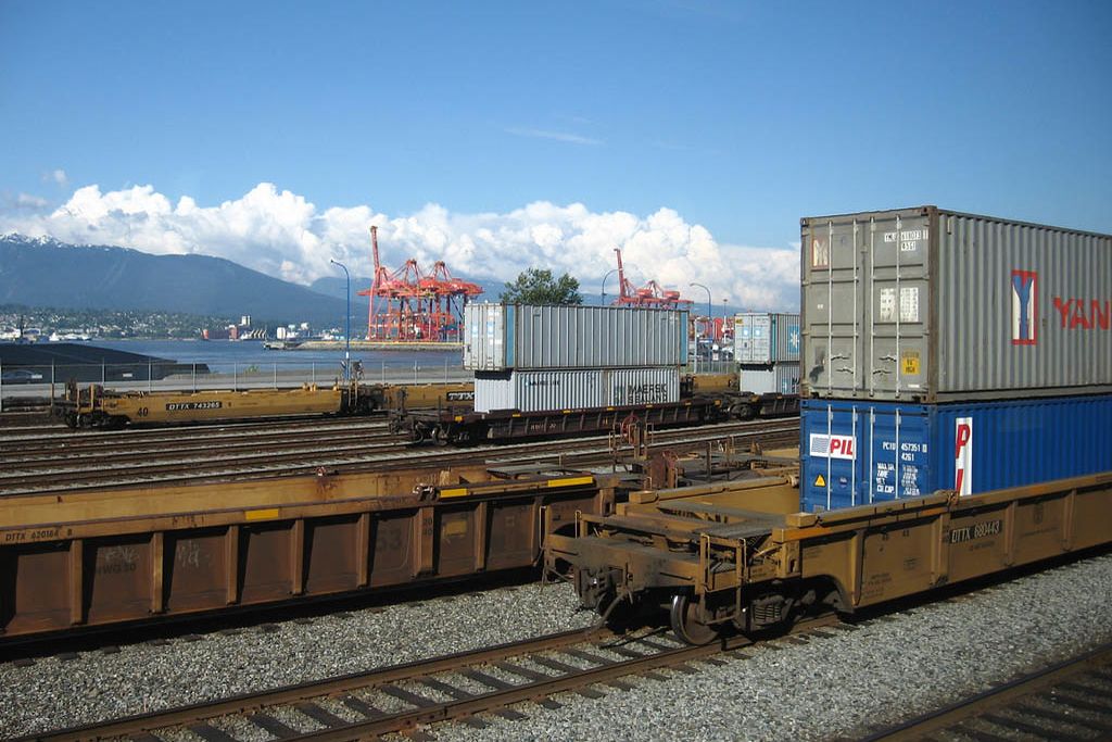Containers on rail wagons next to a terminal in Vancouver